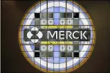  ?? MEL EVANS-ASSOCIATED PRESS ?? This Dec.18, 2014, file photo, shows the Merck logo on a stained glass panel at a Merck company building in Kenilworth, N.J.