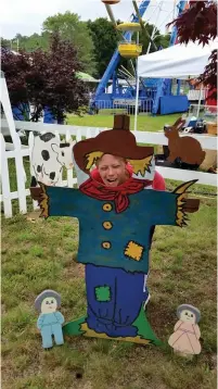  ??  ?? LEFT: Clowns and balloon animals are always favorites. ABOVE: Scarecrows even come kid-sized at the fair.