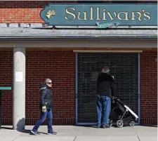  ?? HERAlD STAFF FIlE ?? CLOSED THEN: Sullivan’s was one of the South Boston businesses that closed on March 15 fearing large crowds.