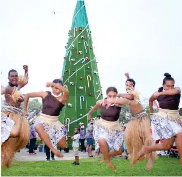 ?? Photo: Leon Lord ?? Vodafone Fiji celebrated the lighting of its Christmas tree at My Suva Park, on December 8, 2021.