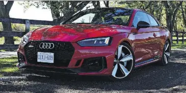  ?? PHOTOS: CHRIS BALCERAK/ DRIVING ?? The 2019 Audi RS5 coupe looks slick on the outside and inside, delivering a sporty ride with serious horsepower.