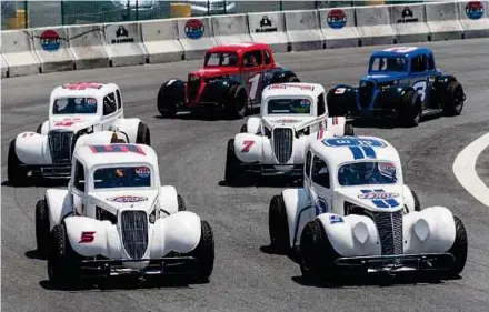  ??  ?? The Legend Car class has drivers competing in identical race cars with a minimum overall weight of 590kg, and powering a factory-stock Yamaha FJ1200 engine rated at 132 brake horse power.