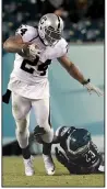  ?? AP/MICHAEL PEREZ ?? Marshawn Lynch (24) rushed for 95 yards on 25 carries, but the Oakland Raiders lost 13-10 to the Philadelph­ia Eagles on Monday night.