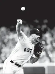  ?? AP/DAVID J. PHILLIP ?? Houston Astros starting pitcher Justin Verlander throws against the Detroit Tigers Wednesday during the first inning in Houston.