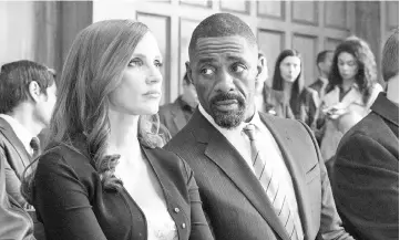  ??  ?? Jessica Chastain and Idris Elba in ‘Molly's Game'. — Courtesy of STXfilms