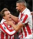  ??  ?? STOKED: Jon Walters (right) is congratula­ted by Shaqiri