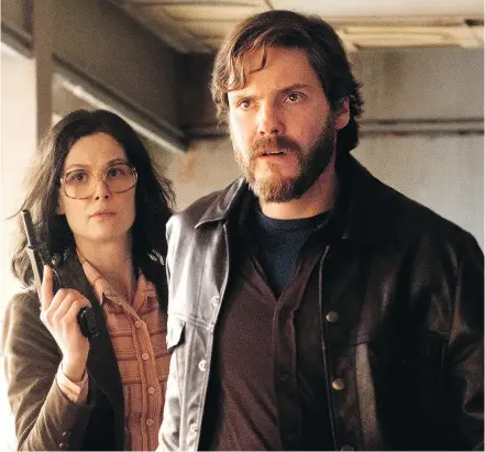  ?? — FOCUS FEATURES ?? Rosamund Pike and Daniel Brühl star in 7 Days in Entebbe, about a 1976 hijacking.