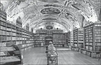  ?? RICK STEVES/RICK STEVES’ EUROPE ?? Prague’s Strahov Monastery library was a center of Baroque learning.