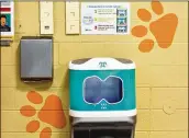  ?? JENNI GIRTMAN FOR THE AJC 2020 ?? “Iggy,” 30e Scientific’s aqueous ozone hand washing station in the Bryant Elementary cafeteria in Mableton, helps clean kids’ hands before they pick up their school lunches.