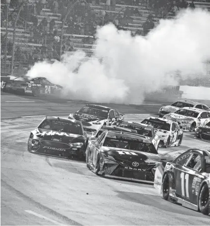  ?? LEE LUTHER ?? Chase Elliott crashes into wall during the closing laps of the First Data 500 last Oct. 29 at Martinsvil­le Speedway. JR./USA TODAY SPORTS