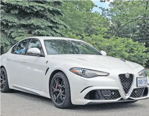  ?? GRAEME FLETCHER / DRIVING. CA ?? The 2017 Alfa Romeo Giulia Quadrifogl­io shows off its classic lines.