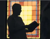  ?? ROBERT F. BUKATY — THE ASSOCIATED PRESS ?? A member of Waldoboro United Methodist Church sings a hymn during a service June 20 in Waldoboro, Maine. The drop in attendance at the church, in part due to COVID-19, forced its closure. The last sermon was on June 27.