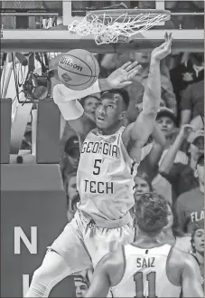  ?? File, Bruce Newman / The Oxford Eagle via AP ?? Georgia Tech guard Josh Okogie (5) is the unquestion­ed leader of the team after averaging 16.1 points and 5.4 rebounds per game in his freshman season.