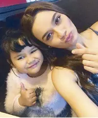  ??  ?? Yasmien Kurdi with daughter Ayesha