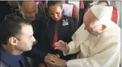  ?? L’OSSERVATOR­E ROMANO VATICAN MEDIA/POOL PHOTO VIA AP ?? Pope Francis marries flight attendants Carlos Ciuffardi, left, and Paola Podest, center, during a flight Thursday from Santiago, Chile, to Iquique, Chile.