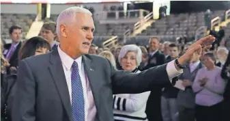  ?? DARRON CUMMINGS, AP ?? Vice President- elect Mike Pence waves as he arrives for the inaugural ceremony for Indiana's statewide office holders on Jan. 9, 2017, in Indianapol­is.