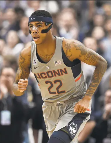  ?? Jessica Hill / Associated Press ?? UConn’s Terry Larrier will have to wear a protective mask for the remainder of the season after having surgery to repair a fractured sinus wall.