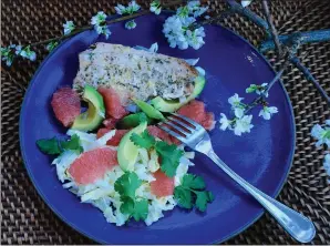  ??  ?? Pan-roasted salmon with grapefruit-cabbage slaw.