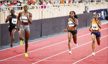  ??  ?? Bahamas’ Shaunae Miller-Uibo (second left), Jamaica’s Shelly-Ann Fraser-Pryce (second right) and Ivory Coast’s Marie-Josee Ta Lou (right) compete in the women’s 200m. — AFP photo