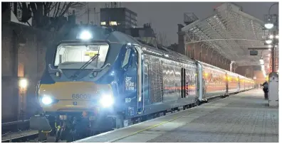  ?? TIM SQUIRES. ?? Chiltern Railways hires Class 68s from Direct Rail Services to haul its ‘Silver’ trains. As well as six silver ‘68s’, two ‘standard’ locomotive­s can also be used. On December 27 2015, 68009 Titan stands at London Marylebone before hauling the 1810 to...