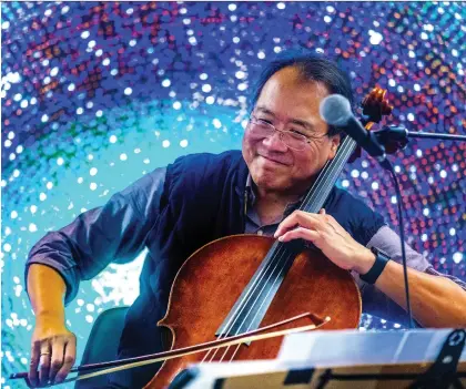  ?? DAVE SIDAWAY ?? Superstar cellist Yo-Yo Ma performed a free concert at the Place des Arts metro station in Montreal on Saturday.