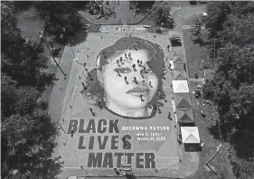  ?? Patrick Smith, Boston Herald file ?? A mural depicting Breonna Taylor is painted at Chambers Park in Annapolis, Md., in July.