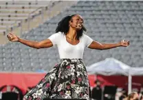  ?? Gary Fountain / Contributo­r ?? Jeanine de Bique triumphs as Maria in Houston Grand Opera’s “My Favorite Things: Songs From the Sound of Music” at TDECU Stadium at the University of Houston.