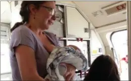  ?? MARIA DE LOS ANGELES-BAIDA VIA AP ?? This photo provided by Maria de Los Angeles-Baida shows Emily France with her 4-month-old son Owen in Denver. France, who says her infant son overheated on a delayed United Airlines flight at Denver’s airport, has hired an attorney and hopes the...