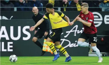  ??  ?? Jadon Sancho has been hard to stop by legal means in the Bundesliga this season. Photograph: Leon Kuegeler/Reuters