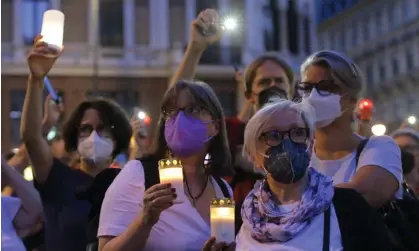  ?? ?? A vigil in Stephanspl­atz, central Vienna, to commemorat­e Austrian doctor Lisa-Maria Kellermayr, 1 August. Photograph: Heinz-Peter Bader/Getty Images