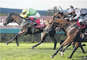  ?? Picture: Getty Images. ?? Frankie Dettori and Lancelot Du Lac, left in yellow and green, won the Qatar Stewards Cup Handicap Stakes on day five of the Qatar Goodwood Festival on Saturday.