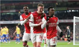  ?? ?? Eddie Nketiah (right) celebrates with Rob Holding and Folarin Balogun after scoring the first goal of a poacher’s hat-trick against Sunderland. Photograph: Michael Zemanek/ Shuttersto­ck