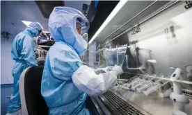  ?? Germany. Photograph: Thomas Lohnes/AFP/Getty Images ?? Employees at the manufactur­ing site of German company BioNTech in Marburg, central