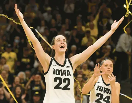  ?? CLIFF JETTE/AP ?? Caitlin Clark celebrates during Senior Day ceremonies March 3 in Iowa City, Iowa. Minnesota dad Asitha Jayawarden­a wrote an essay about how much the basketball phenom means to him and his young daughter.