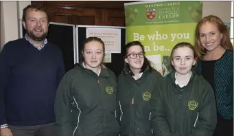  ??  ?? Edmund Joyce and Julie Mulligan with Presentati­on Wexford students, Laura Kavanagh, Chloe Fortune and Jessica Quaid at the Tourism and Event Management display.
