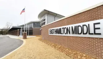  ?? STAFF PHOTO BY MATT HAMILTON ?? The front entrance of East Hamilton Middle School in Apison is shown in 2021.