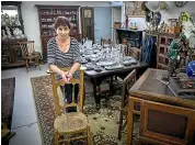  ?? MURRAY WILSON/STUFF ?? Bulls Antiques owner Christine Regan is settling in to the store’s new home on Bridge St, next to Heavenly Pasta.