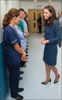  ??  ?? The Duchess of Cambridge speaks to medical workers at Kings College Hospital in south London during a visit following the terrorist attack at London Bridge