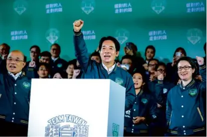  ?? ANNABELLE CHIH/GETTY IMAGES ?? Taiwan’s President-elect Lai Ching-te (above) addressed supporters at a rally Saturday at the party’s headquarte­rs in Taipei. More of his supporters gathered at a campaign event.