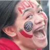  ??  ?? Lorne Casey, 15, top, and Jasmyn Afuro, 17, cheer wildly.