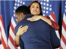  ?? /Reuters/Evelyn Hockstein ?? Losing battle: Republican presidenti­al hopeful Nikki Haley hugs her daughter Rena’s husband Joshua Jackson during the South Carolina Republican presidenti­al primary election in Charleston, South Carolina.