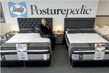  ??  ?? Bedworld sales assistant Dana can help people find their ideal bed. The Ferry Rd store this month has its popular Sealy range on special.
