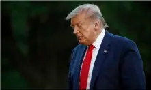  ?? AP Photo/Patrick Semansky ?? President Donald Trump walks across the South Lawn of the White House in Washington, on Saturday after stepping off Marine One as he returns from Kennedy Space Center for the SpaceX Falcon 9 launch.