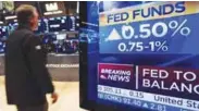  ?? REUTERSPIX ?? A screen on the floor of the New York Stock Exchange displaying the
Fed rate hike announceme­nt on Wednesday. Bank Islam believes the federal funds rate is likely to hit 2.503.0% this year. –