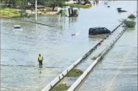  ?? REUTERS ?? A flooded road after a rainstorm in Dubai, United Arab Emirates, on Wednesday.