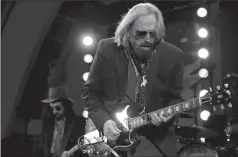  ?? LUIS SINCO/LOS ANGELES TIMES ?? Legendary classic rocker Tom Petty performs with the Heartbreak­ers at the Hollywood Bowl on Sept. 21. Petty died on Monday at the age of 66.