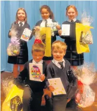  ??  ?? Prestbury pupils Olivia, Connie, Hugo, Joanna and Darcy with their winning Easter cards