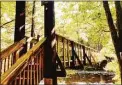  ?? Hearst Connecticu­t Media file photo ?? The Hauser Footbridge at Steep Rock Preserve in Washington Depot.