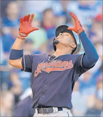  ?? [JOHN SLEEZER/KANSAS CITY STAR] ?? The Indians’ Francisco Lindor celebrates his ninth-inning home run off Royals closer Kelvin Herrera.