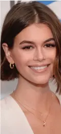  ??  ?? Glittering gold: Kaia Gerber